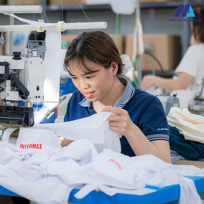 Thời trang Hải Anh - Địa chỉ may áo đồng phục xanh lá chất lượng, giá tốt